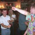 Ian lines up against Mikey P's conker, Conkers at The Swan Inn and 3G Lab Pizza, Cambridge - 10th October 2001