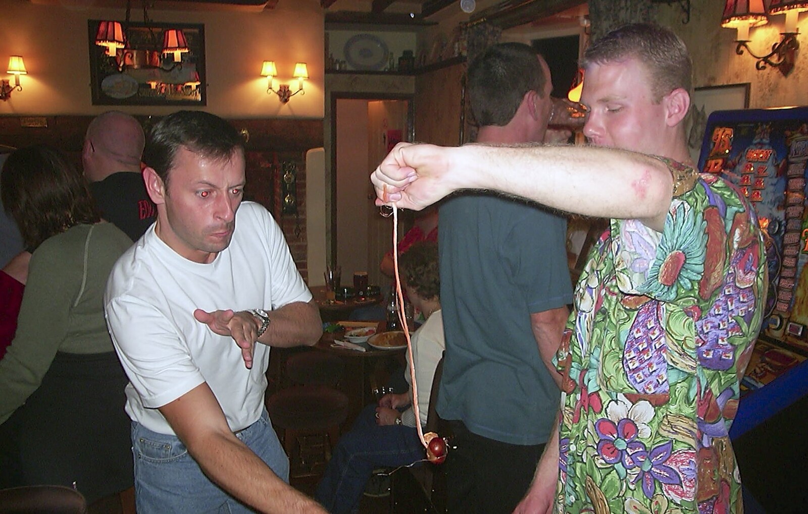Ian has another crack at Mikey P's conker from Conkers at The Swan Inn and 3G Lab Pizza, Cambridge - 10th October 2001