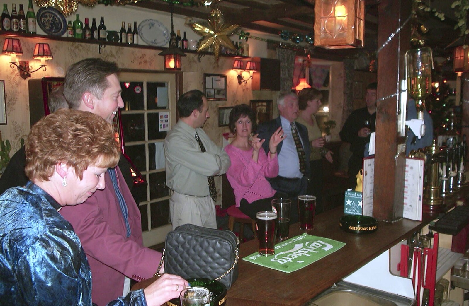 Jenny, Nigel and the gang at the bar from The BSCC Christmas Dinner, Brome Swan, Suffolk - 7th December 2001