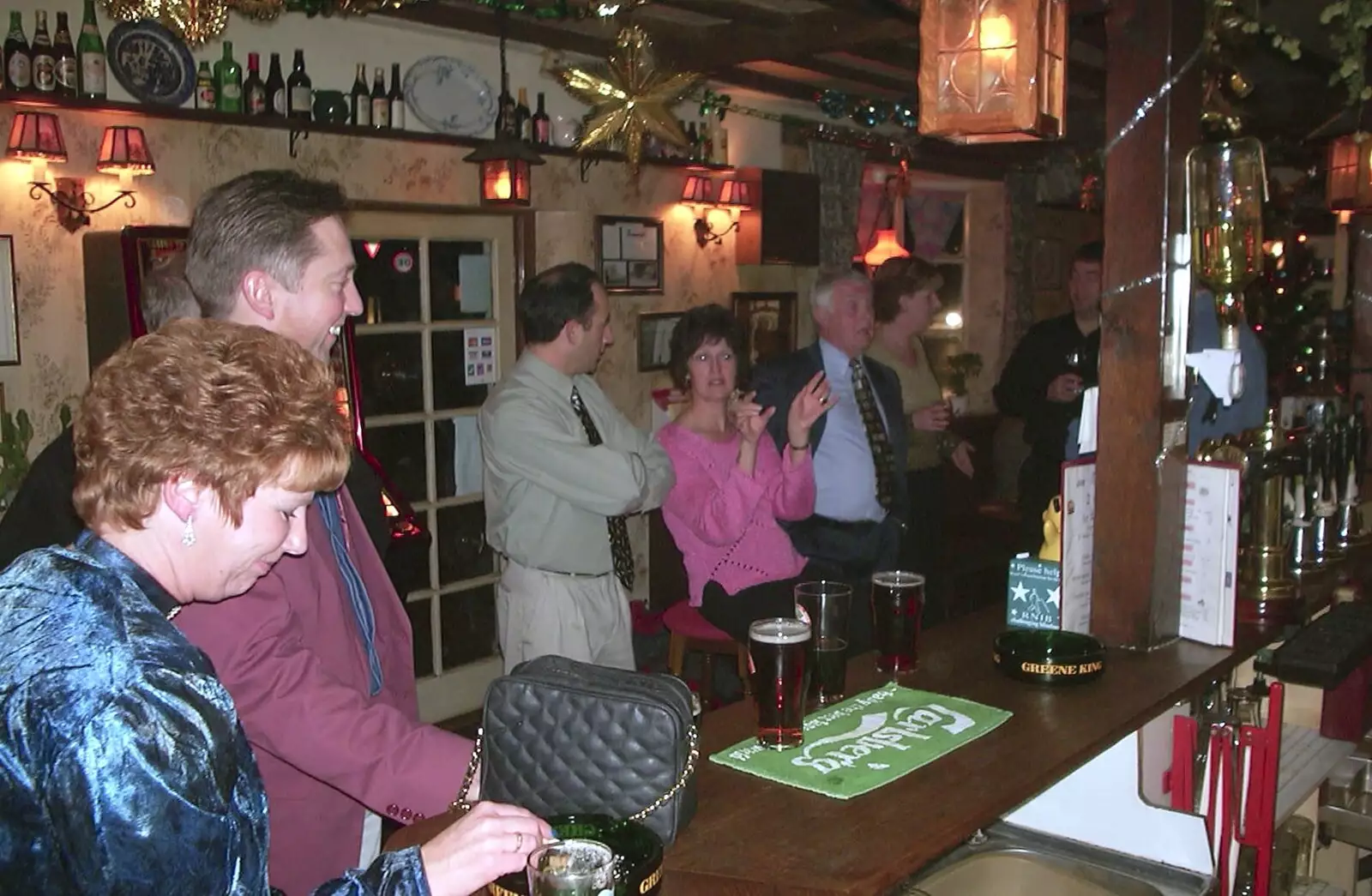 Jenny, Nigel and the gang at the bar, from The BSCC Christmas Dinner, Brome Swan, Suffolk - 7th December 2001