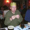 Apple inspects a cracker prize, The BSCC Christmas Dinner, Brome Swan, Suffolk - 7th December 2001