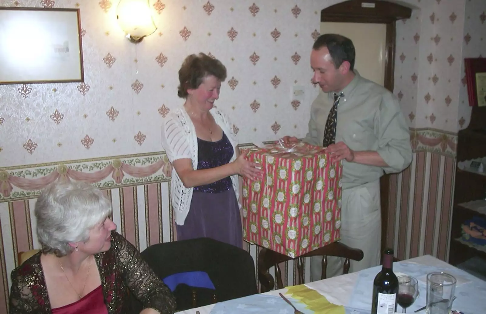 Sylvia gets a large mystery box, from The BSCC Christmas Dinner, Brome Swan, Suffolk - 7th December 2001