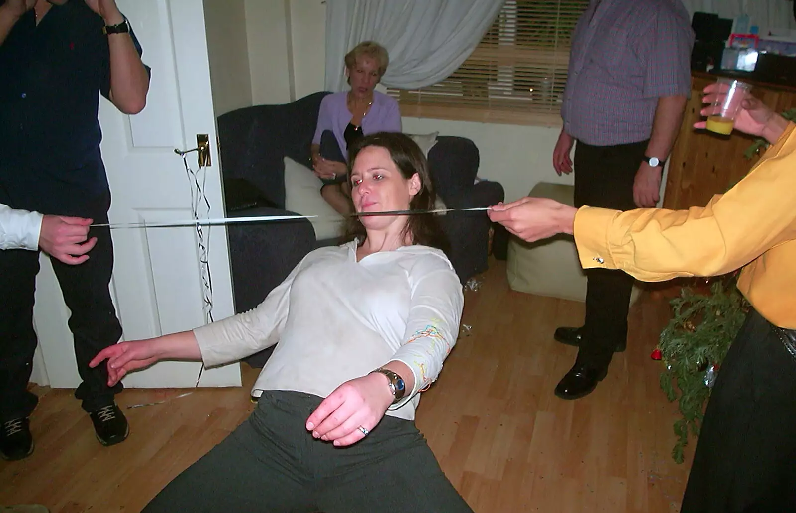 Hannah does the limbo, from A 3G Lab New Year at Michelle's, St Ives, Cambridgeshire - 31st December 2001