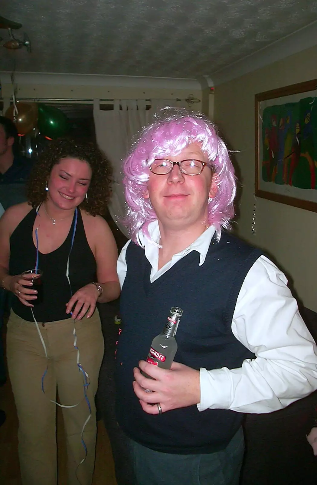 Julian tries the pink wig on, from A 3G Lab New Year at Michelle's, St Ives, Cambridgeshire - 31st December 2001