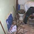 The Old Man pokes around near the toilet, Bathroom Rebuilding, Brome, Suffolk - 1st February 2002