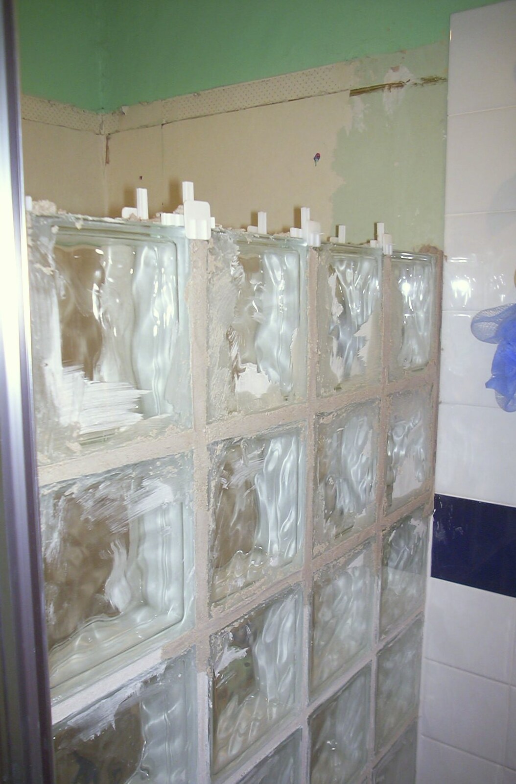 A glass-block wall is built for the shower from Bathroom Rebuilding, Brome, Suffolk - 1st February 2002