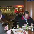 Adrian and Matt eat breakfast at Luton airport, 3G Lab Goes Skiing In Chamonix, France - 12th March 2002