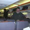 Adrian 'Dogs' on the plane, 3G Lab Goes Skiing In Chamonix, France - 12th March 2002