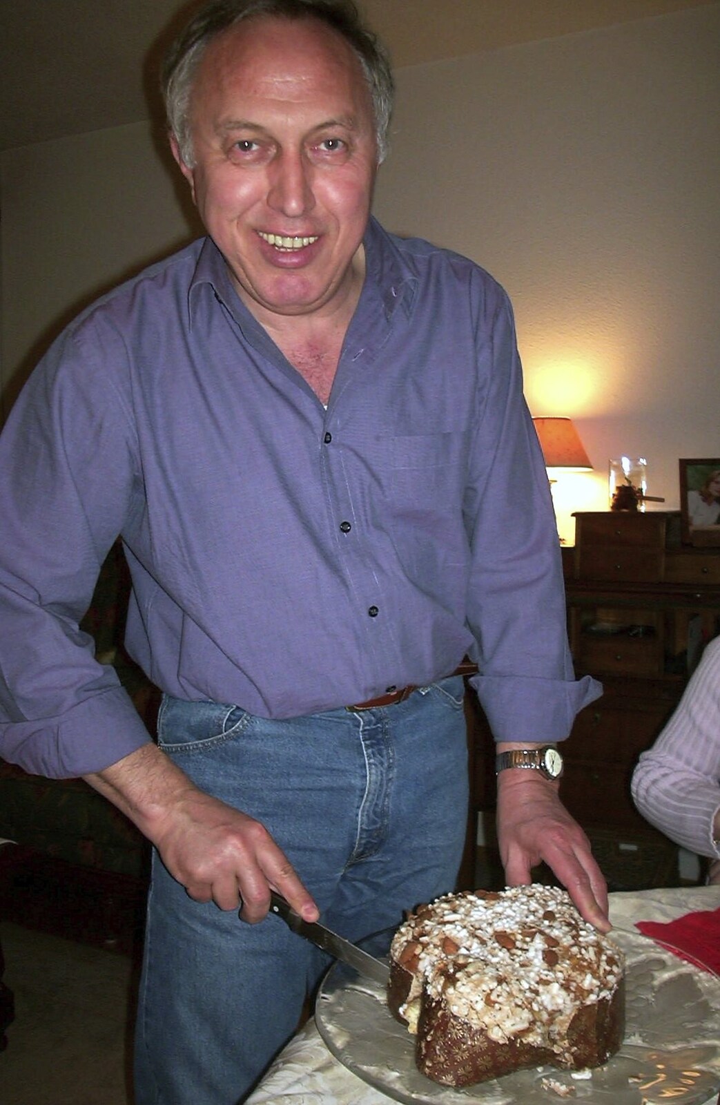 Uncle Bruno cuts up some cake from Nosher in Geneva, Switzerland - 17th March 2002