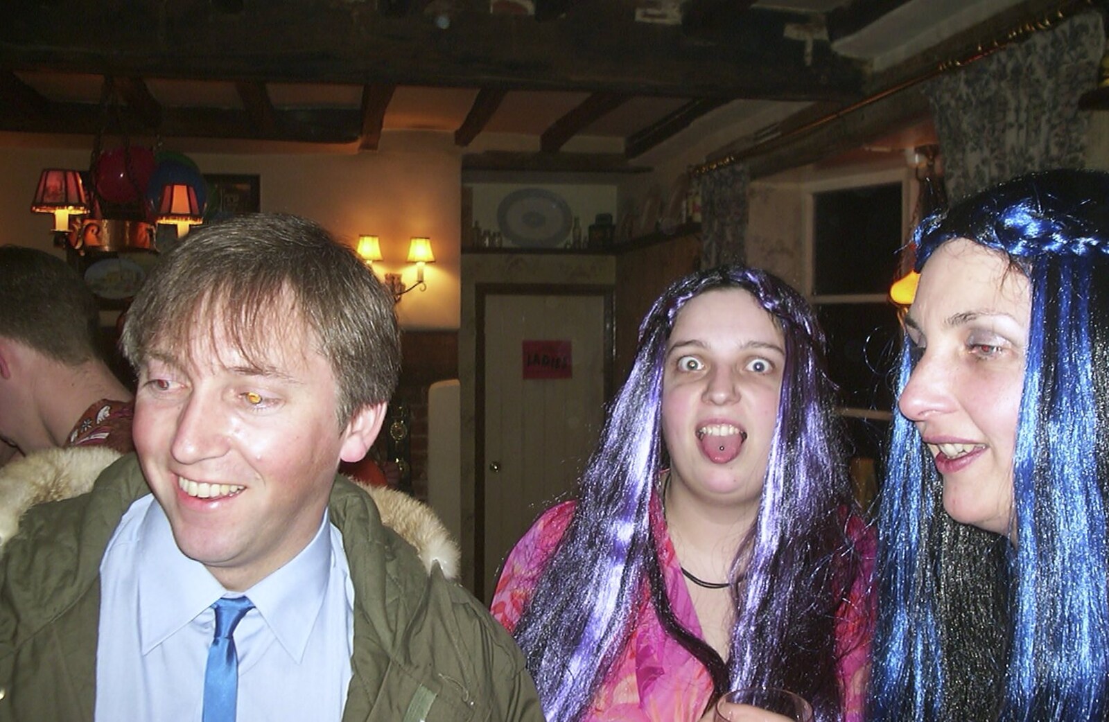 Sue and DH's 30th and 40th Party, The Swan, Suffolk - 18th March 2002: A tongue-piercing is shown off