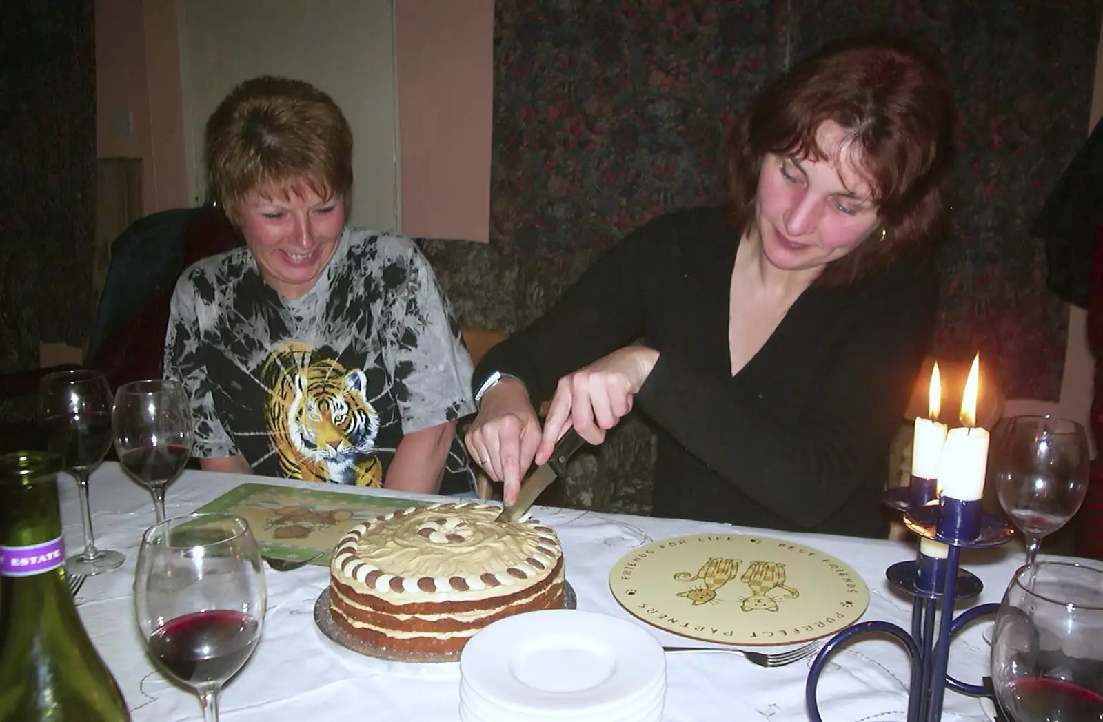 The birthday cake is cut, from Anne's Birthday Curry and Cake, The Swan Inn, Brome - 24th March 2002