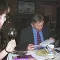 Nigel reads a book, Anne's Birthday Curry and Cake, The Swan Inn, Brome - 24th March 2002