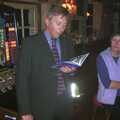 Nigel reads aloud from the book, Anne's Birthday Curry and Cake, The Swan Inn, Brome - 24th March 2002