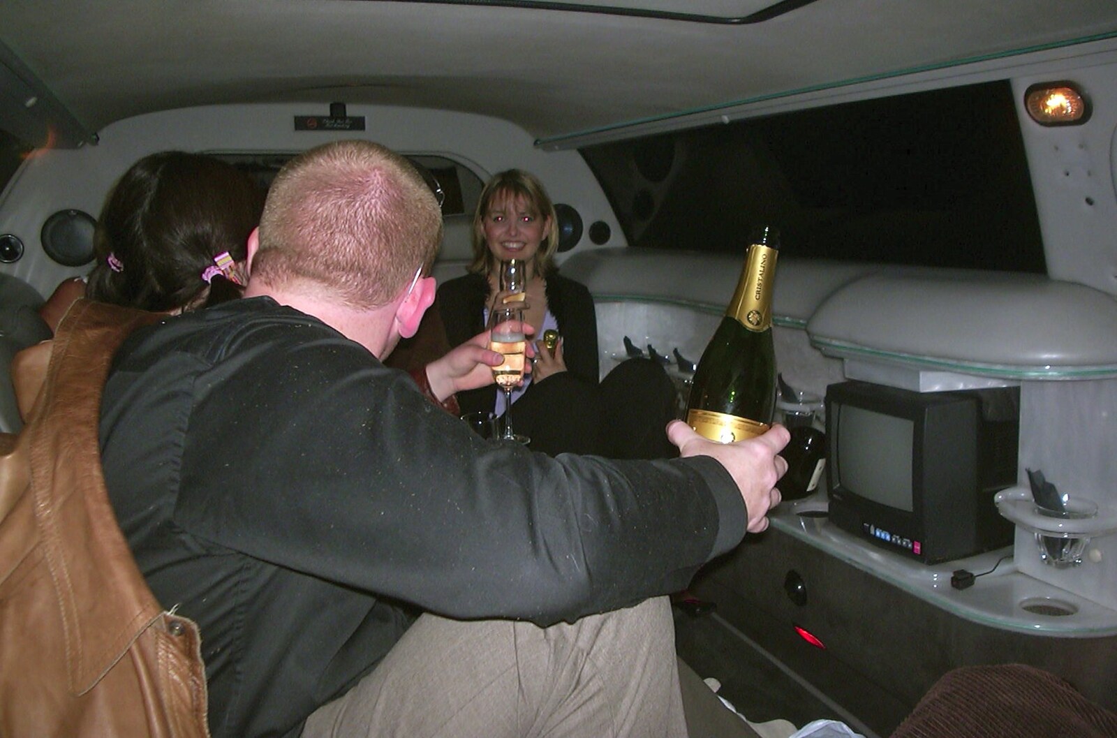 Julian breaks out the champagne from 3G Lab's Carwash Nightclub by Limo, London - 27th April 2002