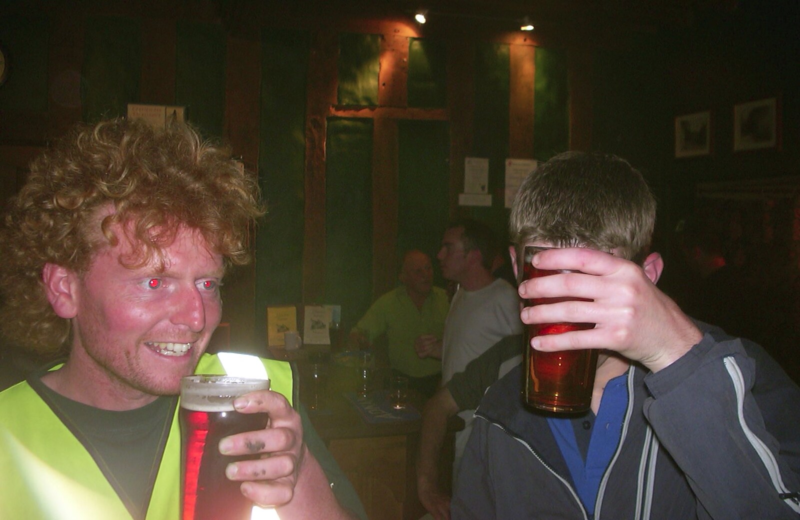 Phil hides behind his beer from The BSCC at Laxfield and Hoxne, Suffolk - 2nd May 2002