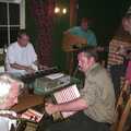 Big Steve gives it some on accordion, The BSCC at Laxfield and Hoxne, Suffolk - 2nd May 2002