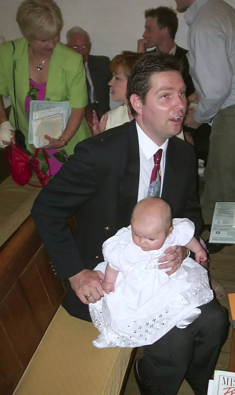 Sean with the baby Sydney, from Sydney's Christening, Hordle, Hampshire - 4th May 2002