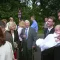 Sean points as people mingle around, Sydney's Christening, Hordle, Hampshire - 4th May 2002