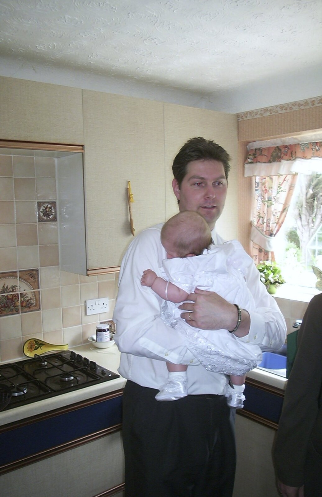 Sean in the kitchen from Sydney's Christening, Hordle, Hampshire - 4th May 2002