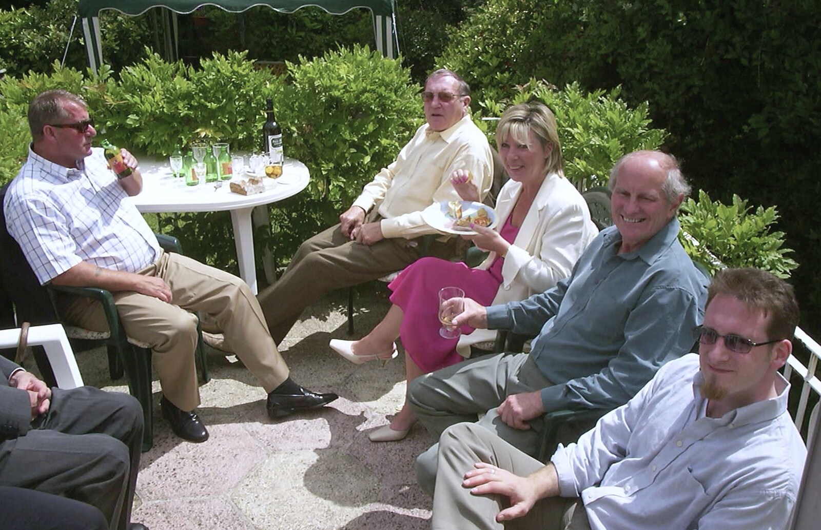 Outside, Bob keeps the guests entertained from Sydney's Christening, Hordle, Hampshire - 4th May 2002