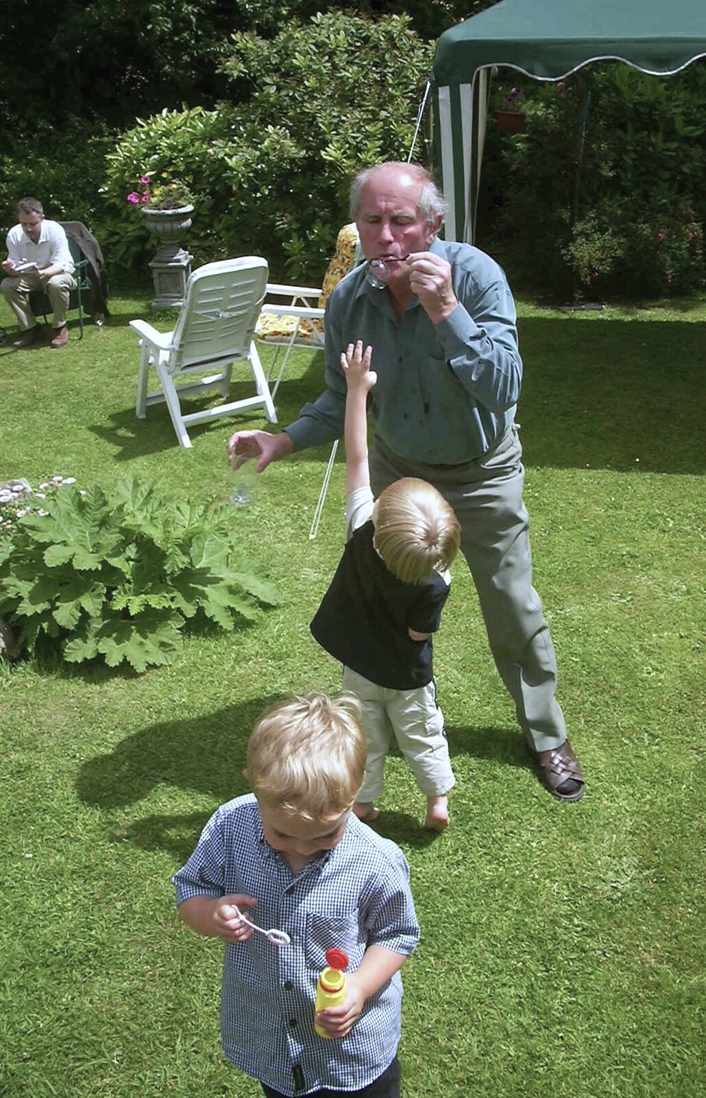 Bob does bubbles from Sydney's Christening, Hordle, Hampshire - 4th May 2002