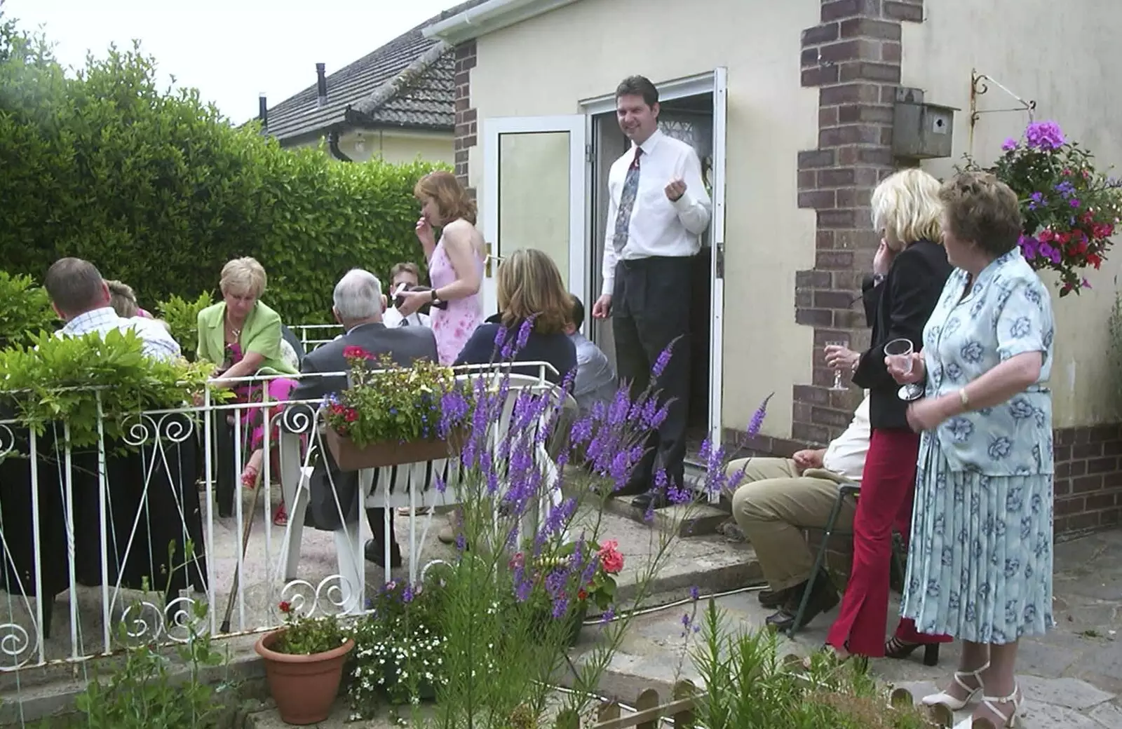 Sean comes out onto the patio, from Sydney's Christening, Hordle, Hampshire - 4th May 2002