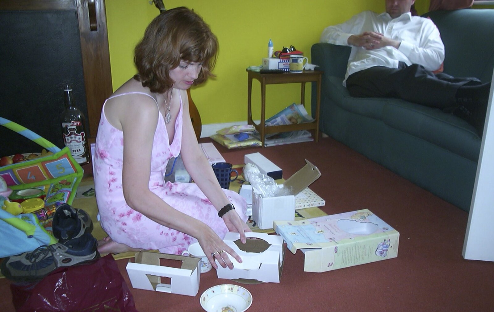 Michelle opens up presents from Sydney's Christening, Hordle, Hampshire - 4th May 2002