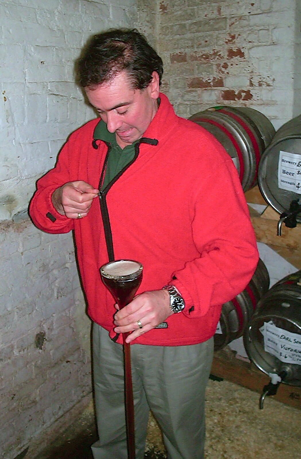 The landlord prepares to do a yard of ale from The Hoxne Beer Festival, Suffolk - 20th May 2002