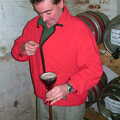 The landlord prepares to do a yard of ale, The Hoxne Beer Festival, Suffolk - 20th May 2002