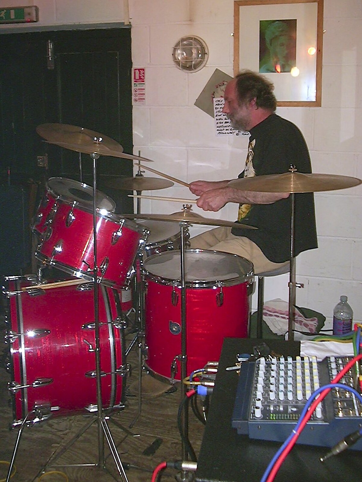 The drummer thrashes the kit from The BBs at the Cider Shed, Banham, Norfolk - 24th May 2002