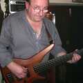 Mark on bass looks up, The BBs at the Cider Shed, Banham, Norfolk - 24th May 2002