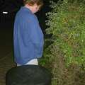 Marc has a wee in a hedge, The BBs at the Cider Shed, Banham, Norfolk - 24th May 2002