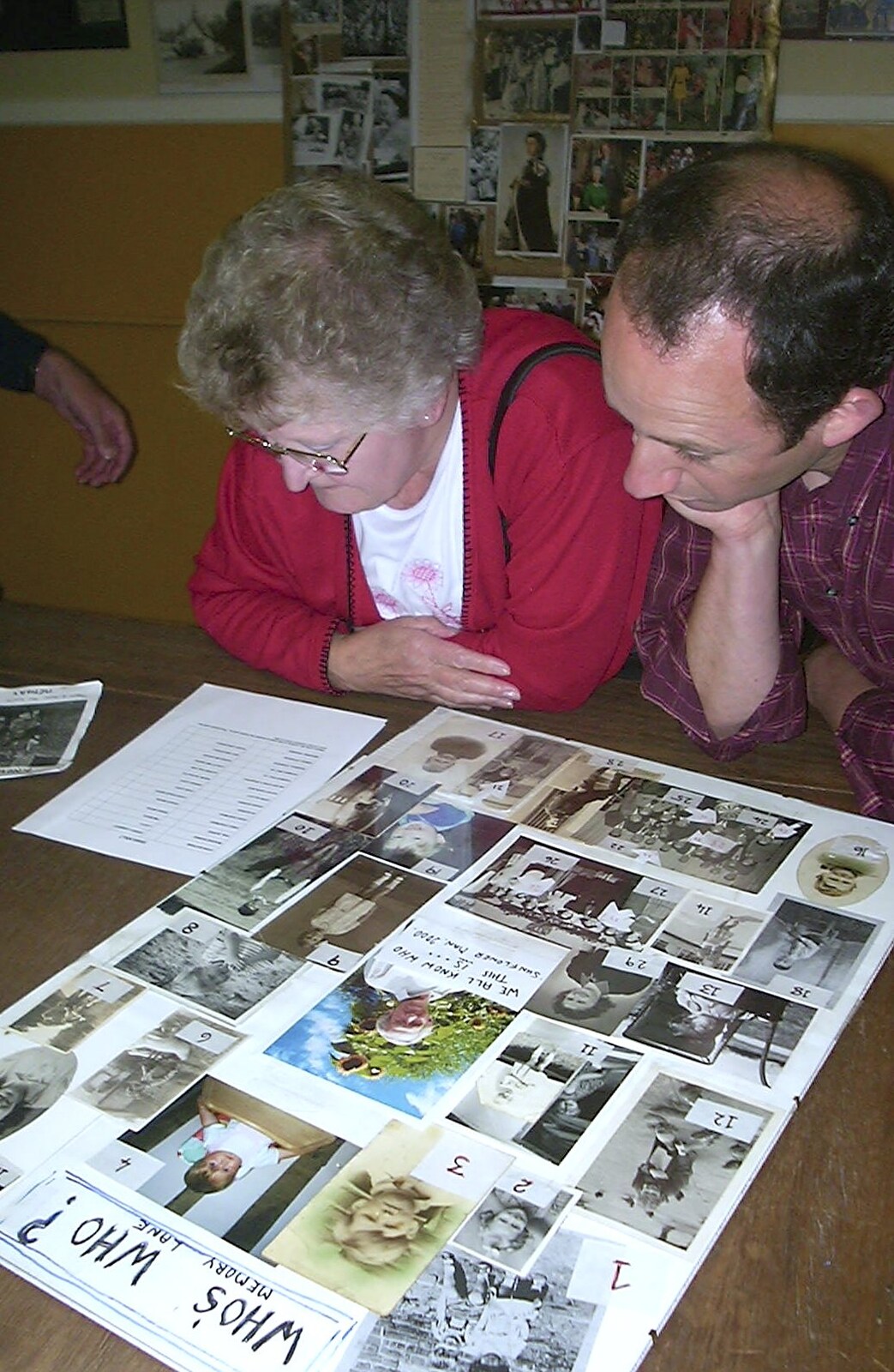 DH looks over some old photos from Golden Jubilee Celebrations, The Village Hall, Brome, Suffolk - 4th June 2002