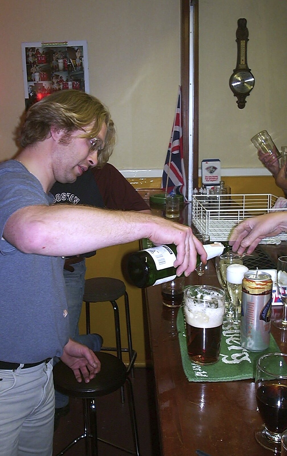Marc pours fizz out from Golden Jubilee Celebrations, The Village Hall, Brome, Suffolk - 4th June 2002