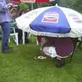 More hiding under a low parasol, A Rainy Barbeque at the Swan Inn, Brome, Suffolk - 15th June 2002