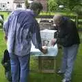 A soggy Nigel gets a beer, A Rainy Barbeque at the Swan Inn, Brome, Suffolk - 15th June 2002