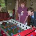 Wavy and Apple on table football, A Rainy Barbeque at the Swan Inn, Brome, Suffolk - 15th June 2002