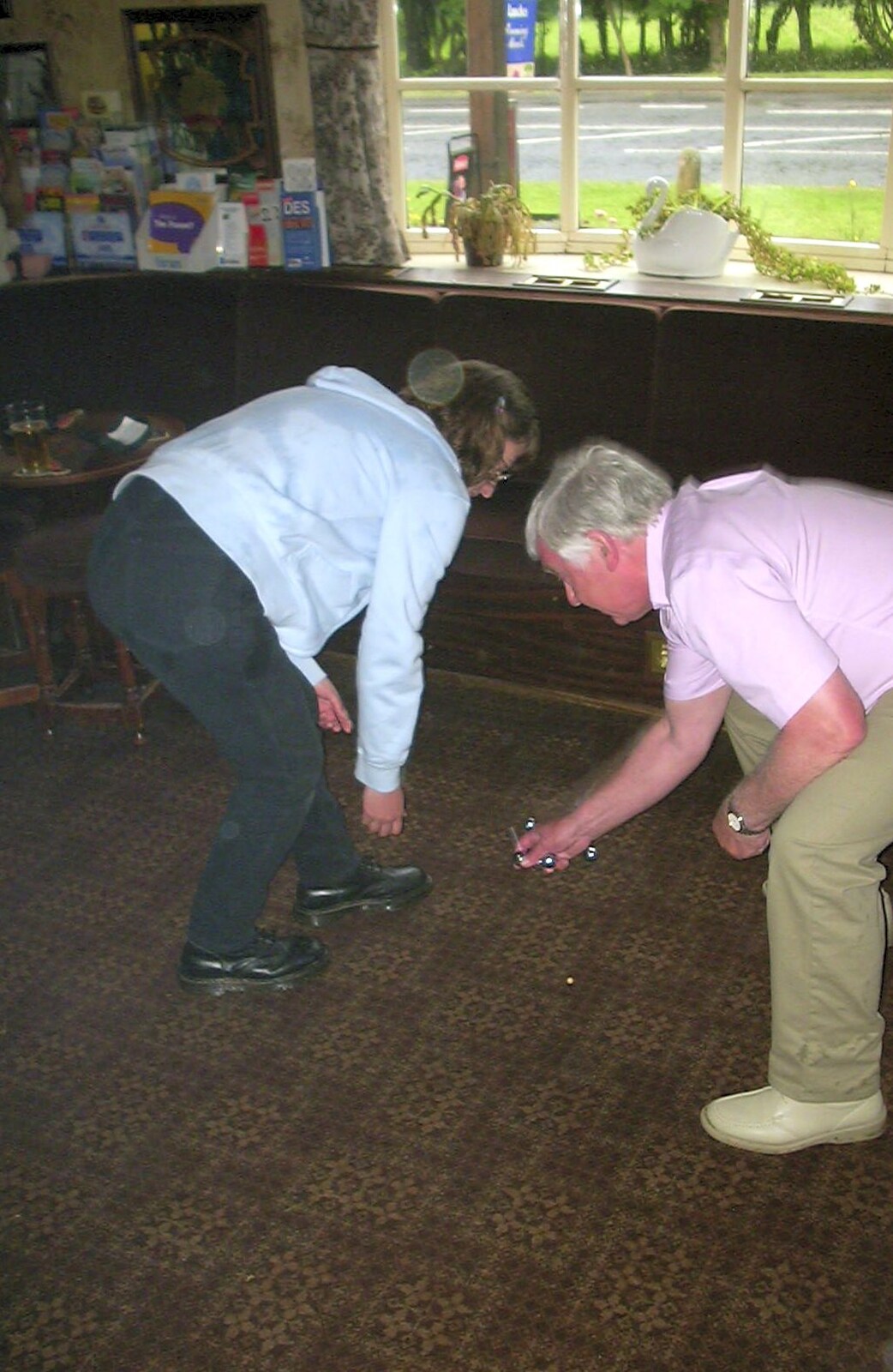 A Rainy Barbeque at the Swan Inn, Brome, Suffolk - 15th June 2002: Suey and Colin continue with carpet bowls
