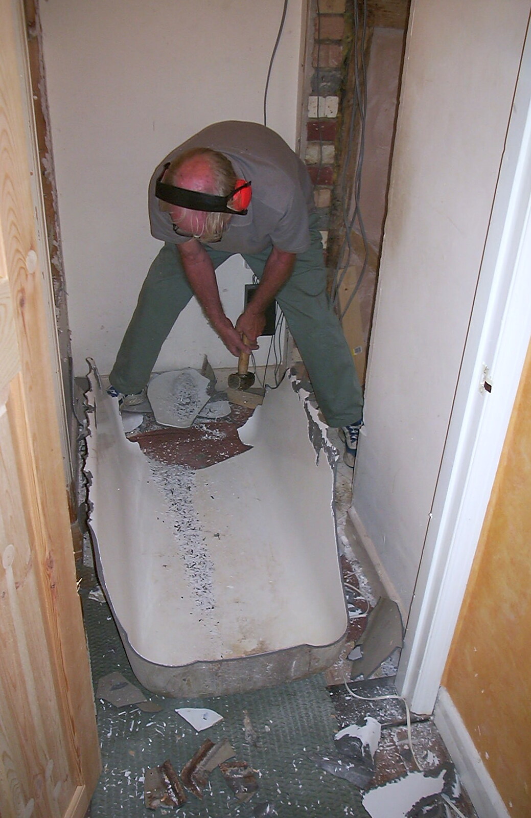 The old man helps smash up a cast iron bath from A Hard-Drive Clock and Other Projects, Brome, Suffolk - 28th June 2002