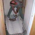 2002 The old man helps smash up a cast iron bath