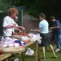 Sylvia hands some food around, DH's BSCC Barbeque, The Old Post Office, Brome, Suffolk - 7th July 2002