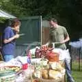 Pippa scoffs a burger, DH's BSCC Barbeque, The Old Post Office, Brome, Suffolk - 7th July 2002