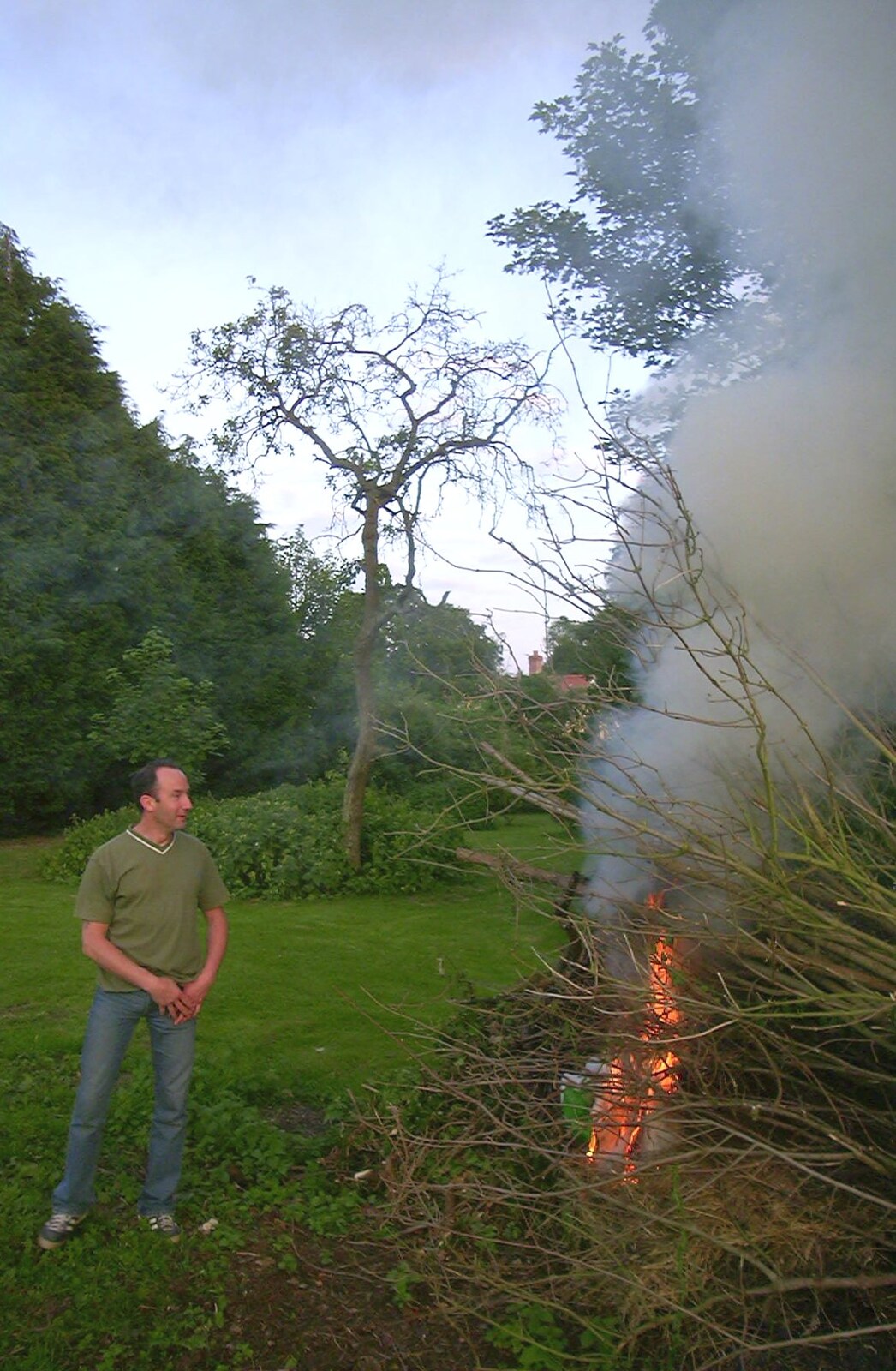 DH sets fire to a bonfire from DH's BSCC Barbeque, The Old Post Office, Brome, Suffolk - 7th July 2002