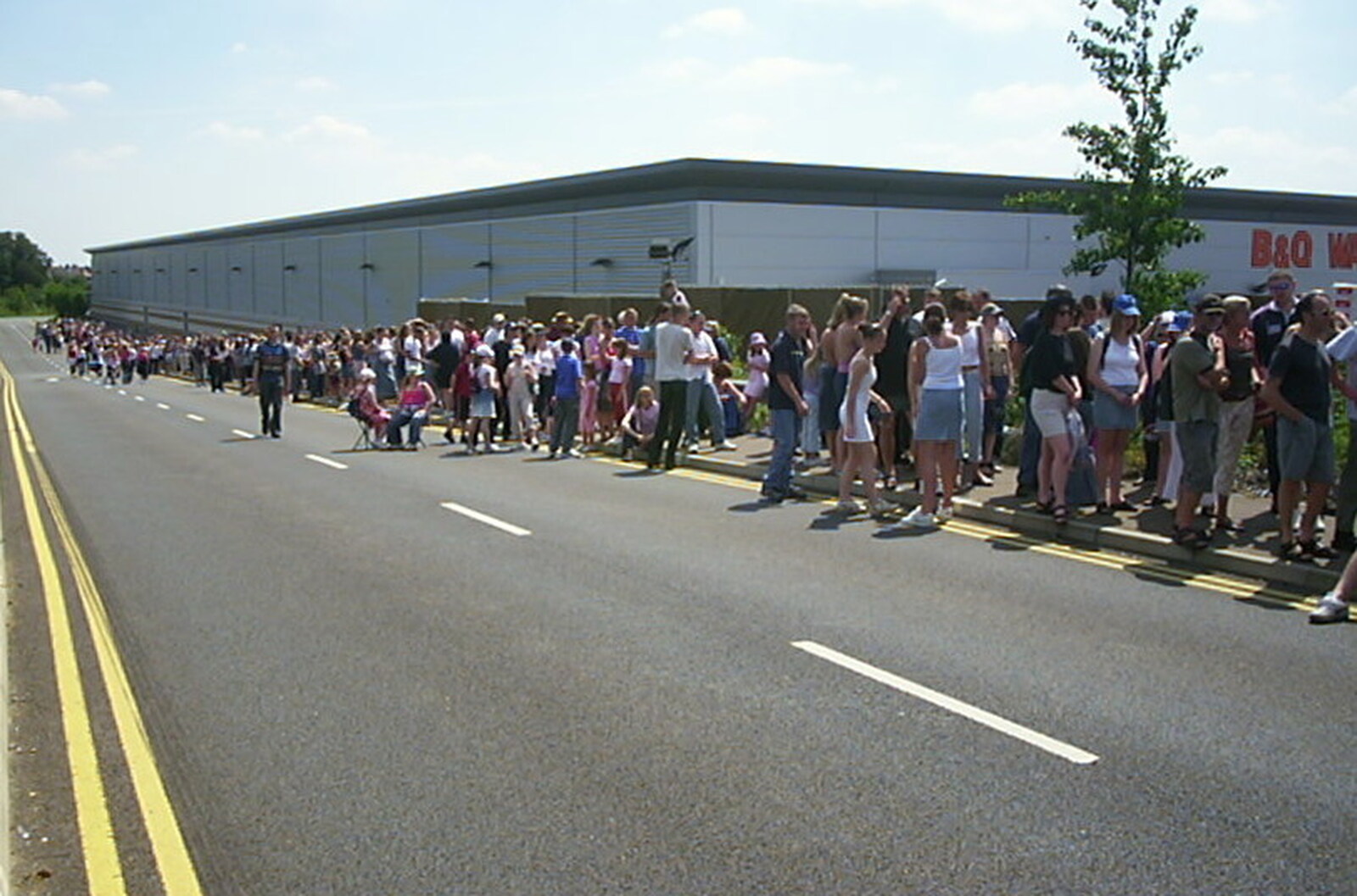 The queue for the bus to Chantry Park from Radio 1's One Big Sunday, Chantry Park, Ipswich - 14th July 2002