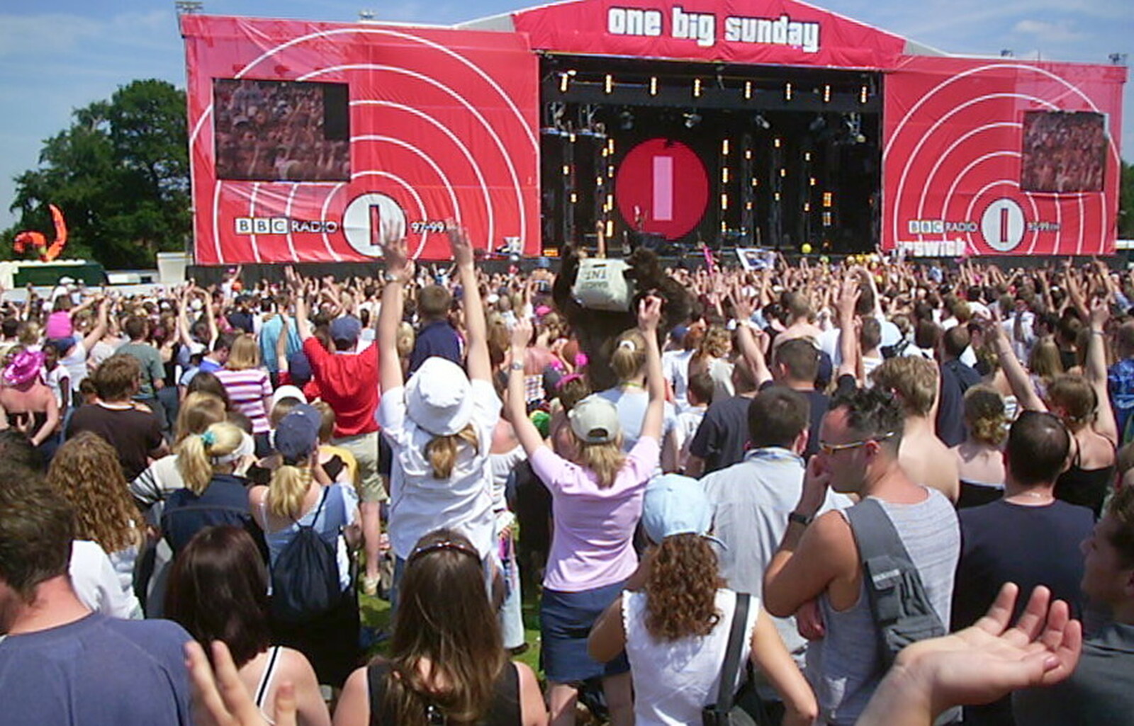 A hands-in-the-air moment from Radio 1's One Big Sunday, Chantry Park, Ipswich - 14th July 2002