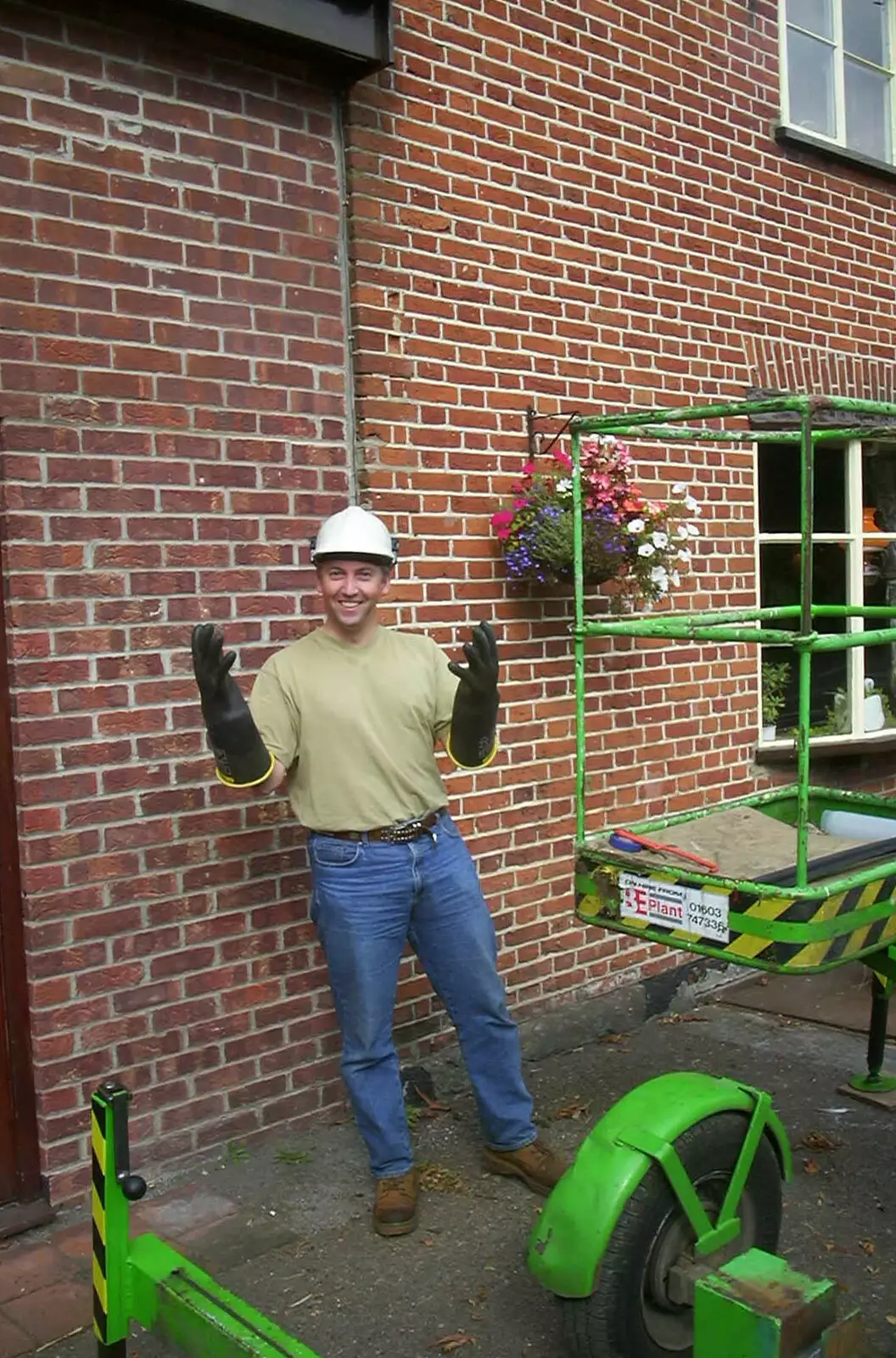 Nigel's got his electrical gloves on, from Alan gets a Cherry Picker, Brome, Suffolk - 2nd August 2002