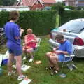 Nigel does some breakfast, A BSCC Splinter Group Camping Weekend, Theberton, Suffolk - 11th August 2002