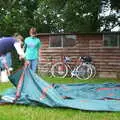 Suey helps roll a tent up, A BSCC Splinter Group Camping Weekend, Theberton, Suffolk - 11th August 2002