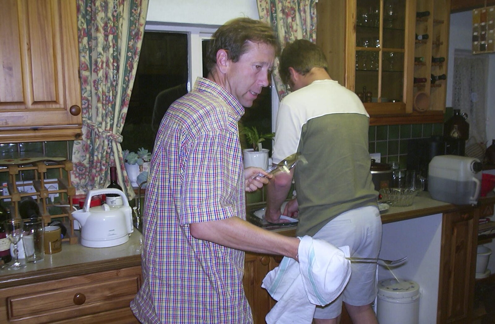 Marc and Apple do the washing up from Nigel and Jenny's Nosh-Up, Thrandeston, Suffolk - 18th August 2002