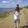 Hamish, with Bruce on piggy-back, points out to sea, Arnewood School Class of '83 Reunion, Fawcett's Field, New Milton - 2nd November 2002